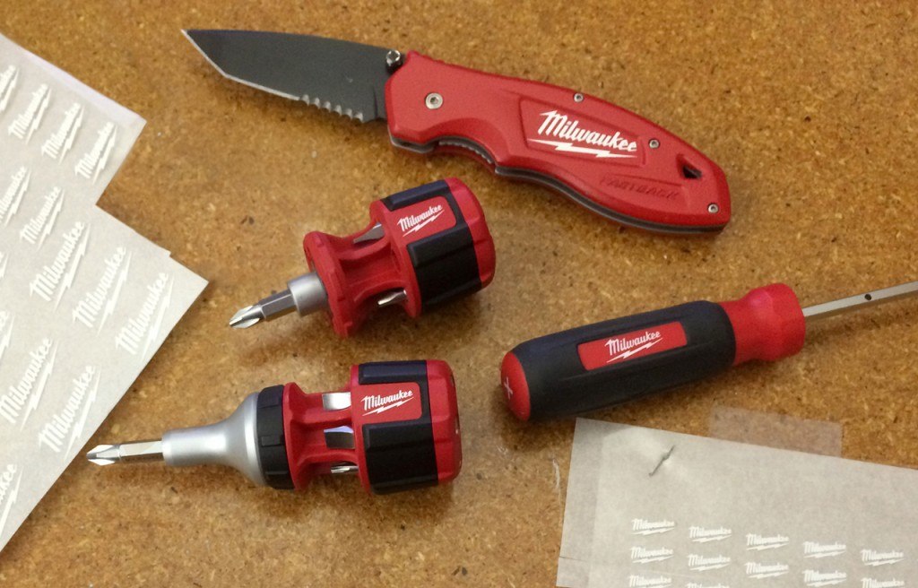 Photographers for Milwaukee Tools took this photo of our dry transfers being used for their product prototype photoshoot. This image shows different tools with the Milwaukee Tool logo applied on the surface of the prototype product