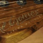 A closeup videocap of a metallic transfer foil applied on a custom guitar in a video from Stewart-MacDonald guitars and string instruments