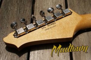 A custom guitar decal transferred onto a Madtown guitar neck.