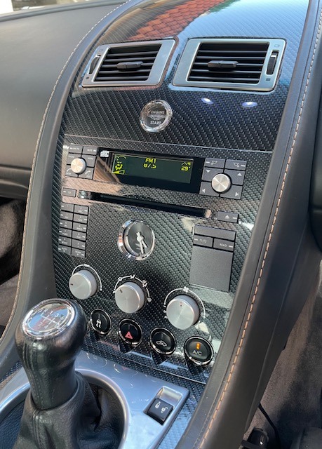 A Control Panel for an Astin Martin automobile that used our custom rub on transfers for the decals.