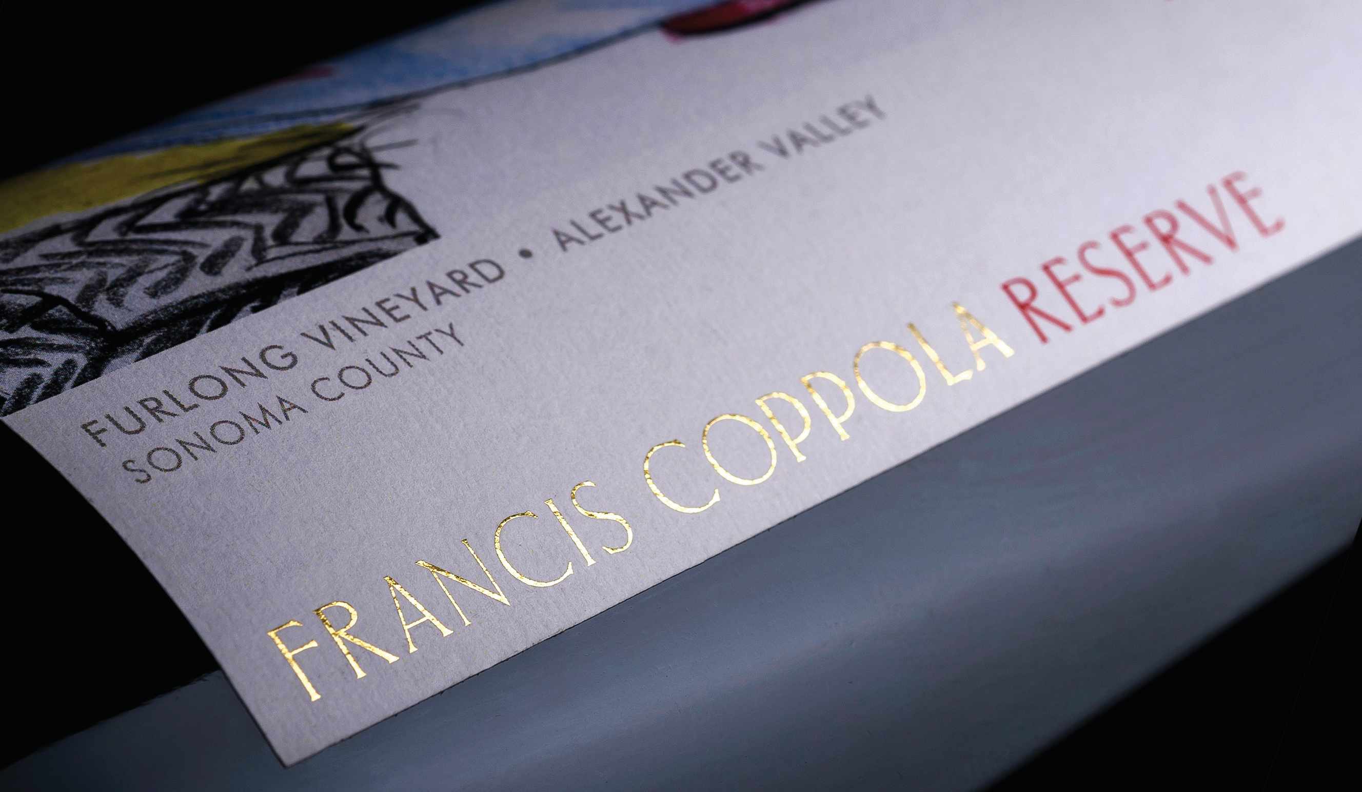 Gold and red foil transfers applied on the wine label