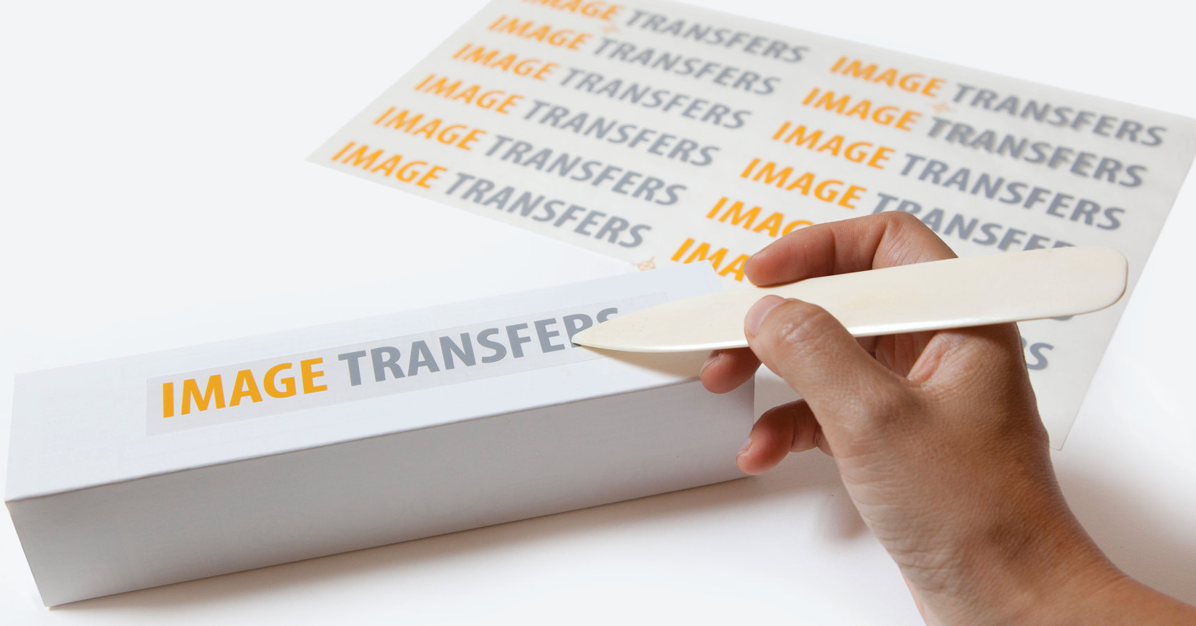Use the supplied burnishing tool to rub down the dry transfer, make sure to apply pressure evenly to insure that the image transfers onto the model smoothly.